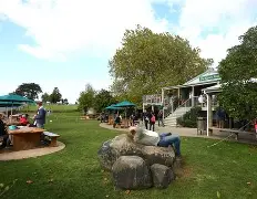 A mesmerizing sunset over the rolling hills of Matamata, as a symbol of the magical journey that awaits you at Hobbiton
