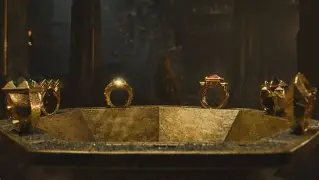 Illustration showing Sauron giving a ring to an Elf