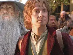 Bilbo sitting alone in his hobbit hole